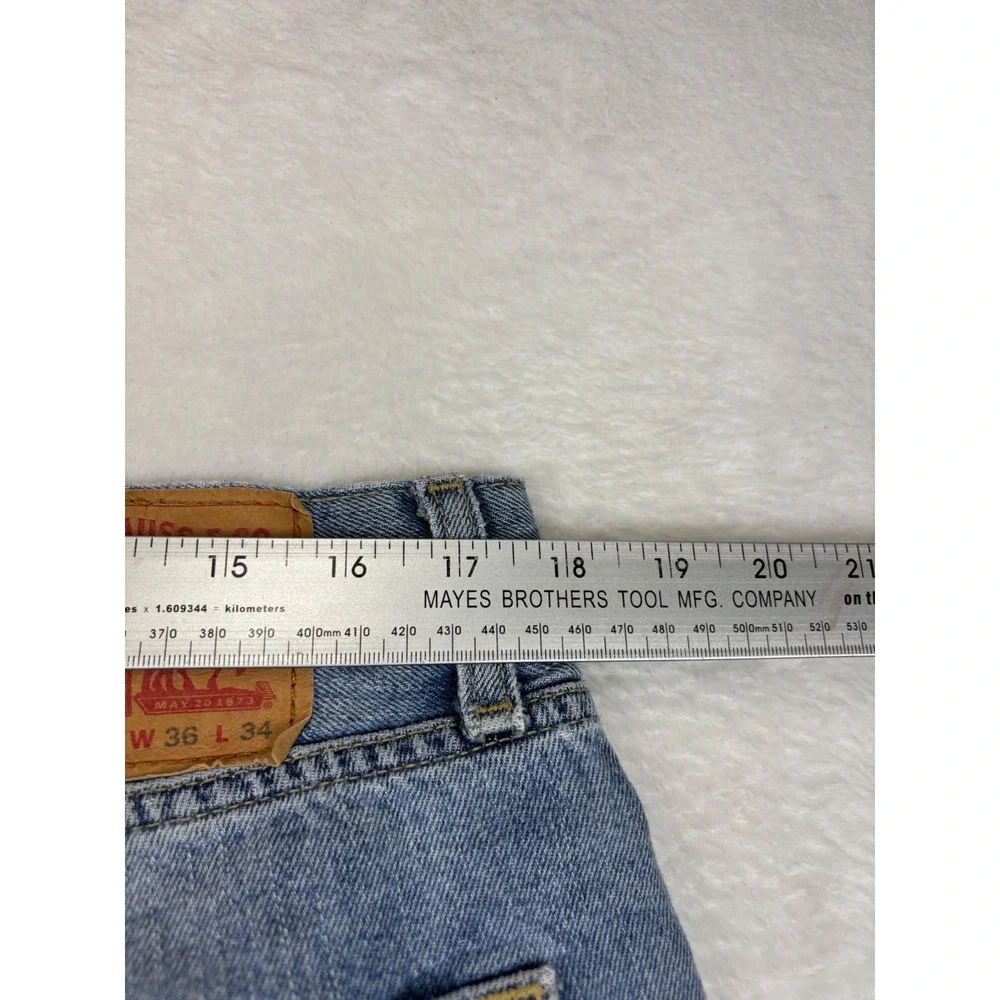 Levis 505 Mens 36x34 Jeans Light Blue Wash Denim Grungy HighLow Fade ripped Hem